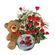 The Best Gift. A basket arrangement of red roses with greens, cute teddy bear and a box of finest cookies.. Prague