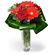 Carmen. A delicate and stylish arrangement of red gerberas and roses in a vase.. Prague