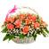 Poetry of feelings. Beautifully decorated basket of pink roses with assorted greens.. Prague