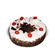 Biscuit cake with cherry. 5 red roses are delivered along with a cake.. Prague